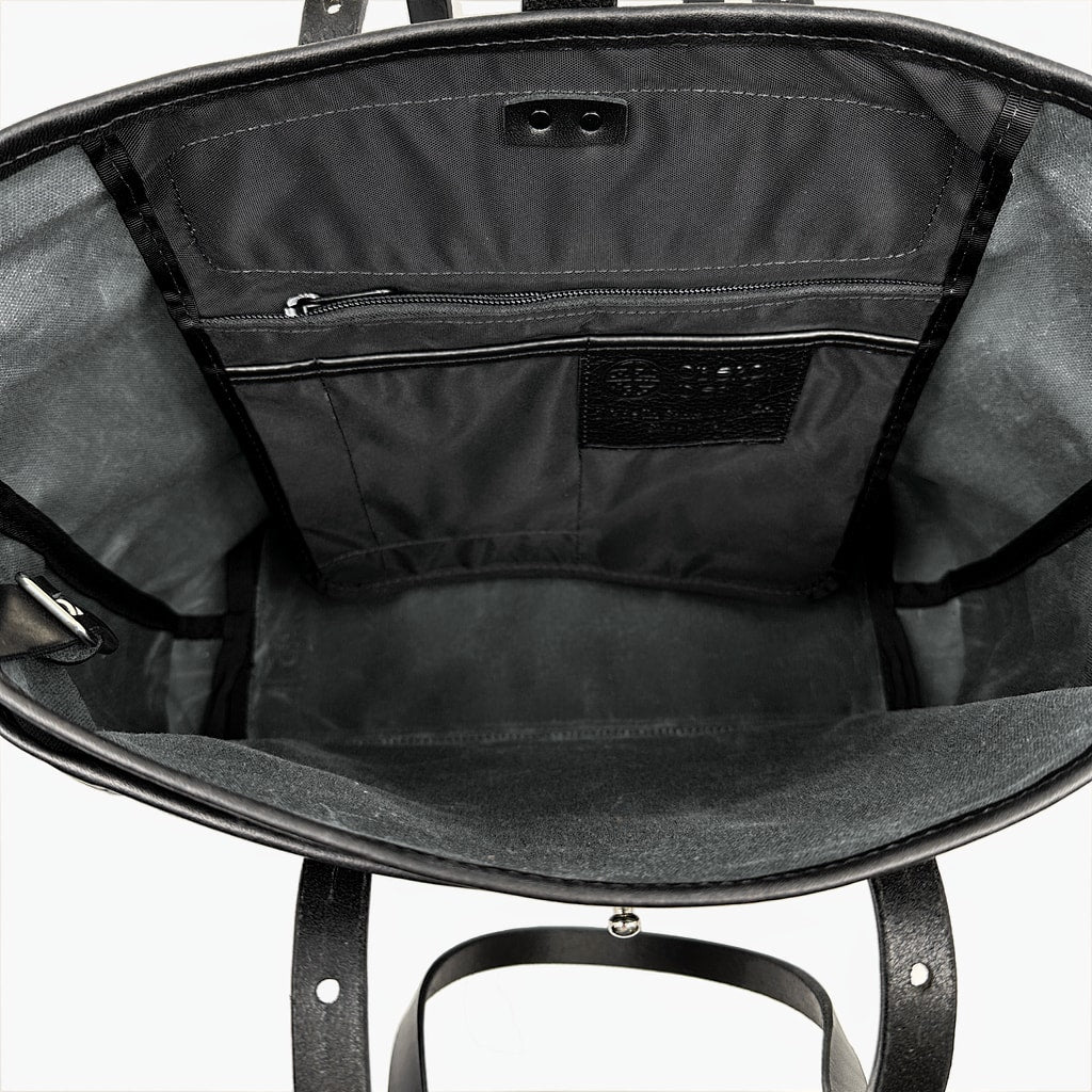 Everyday tote waxed canvas and leather charcoal and black interior pocket detail