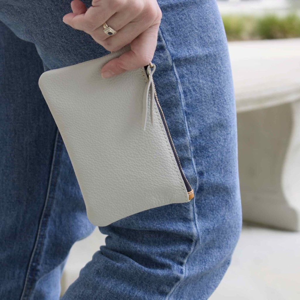 Oberon Design Zipper Pouch with Pacific Leather in Fog, hand holding