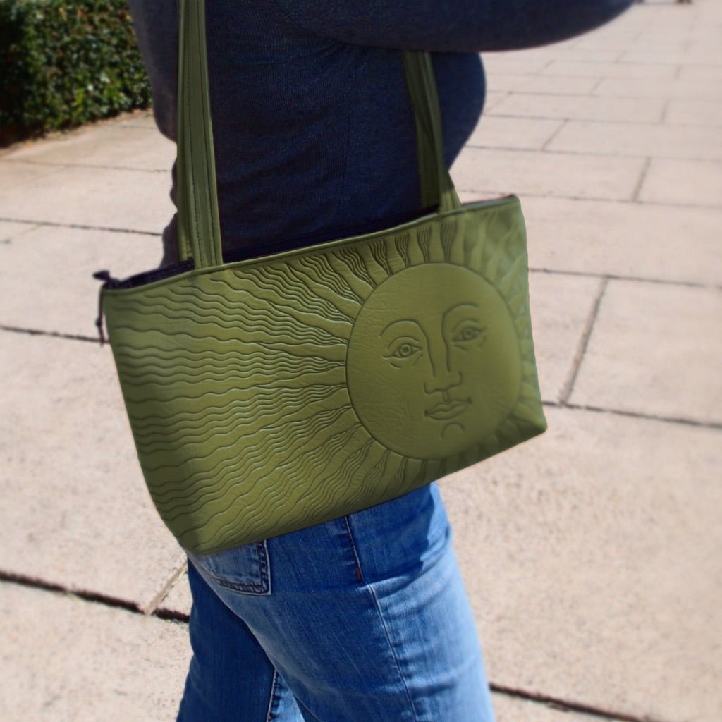 Leather Handbag, Streamline Sun in Fern on model