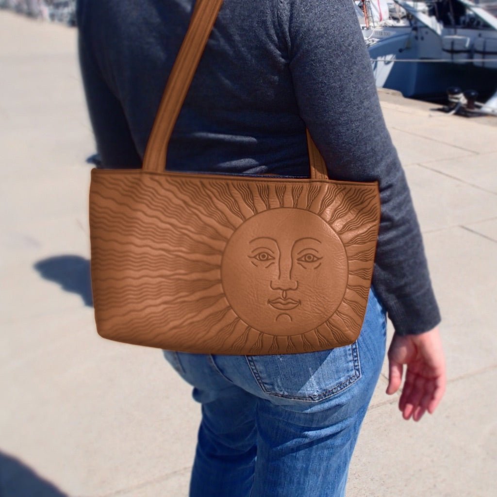 Leather Handbag, Streamline Sun in Saddle on model