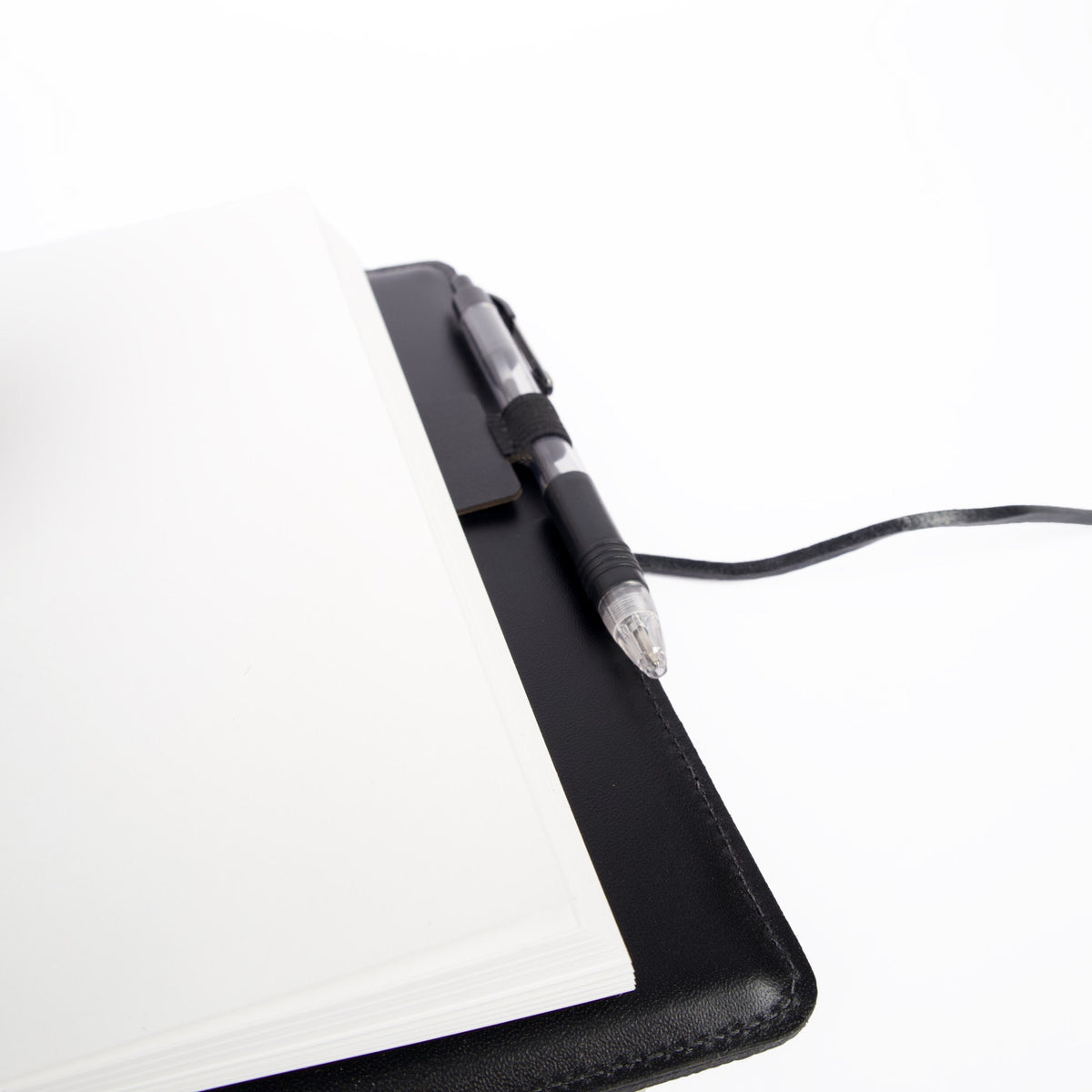 Leather and elastic Self-adhesive Pen Loop in journal, by Oberon Design
