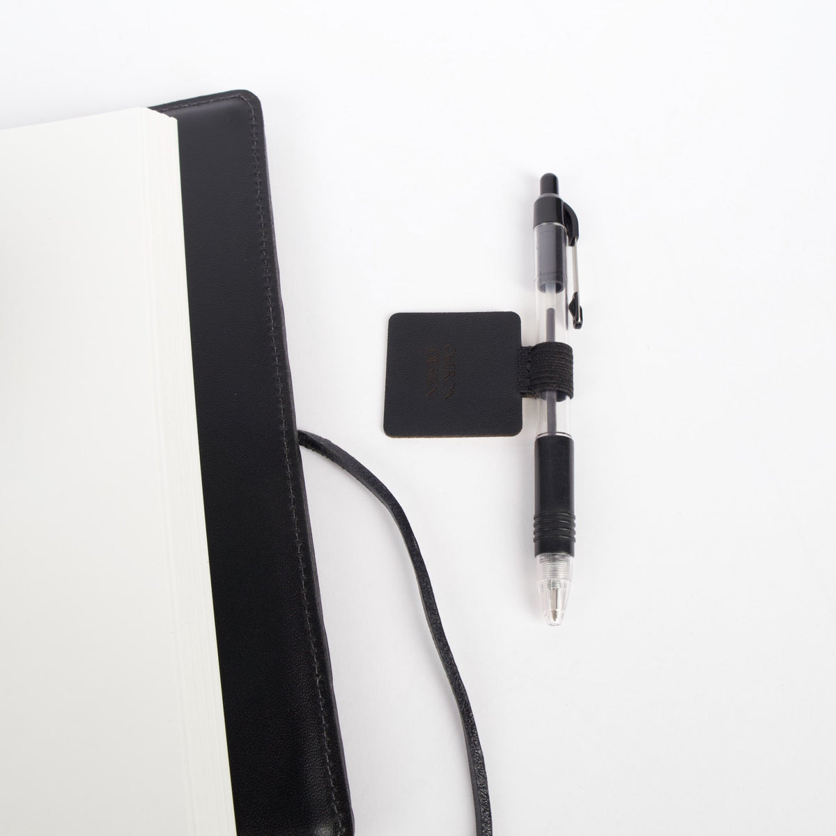 Leather and elastic Self-adhesive Pen Loop with journal, by Oberon Design