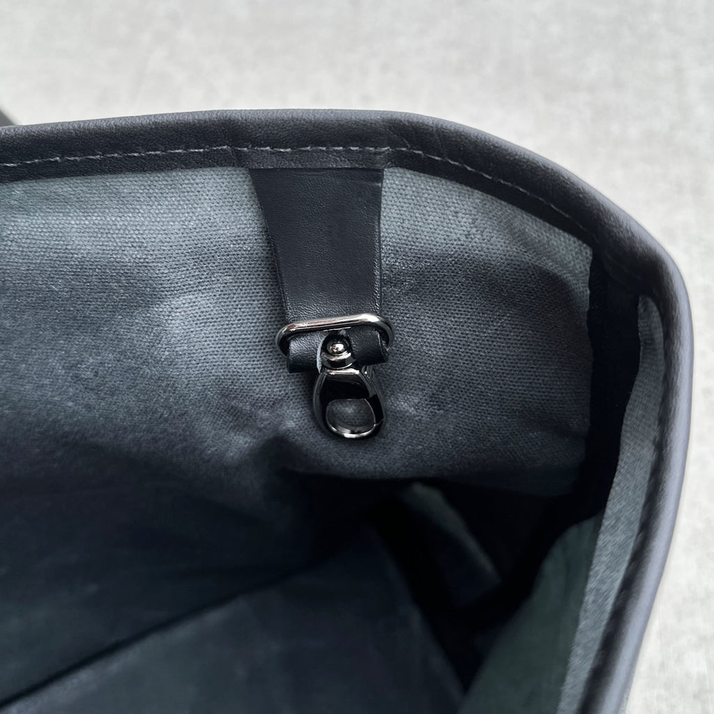 Everyday tote waxed canvas and leather interior key hood detail
