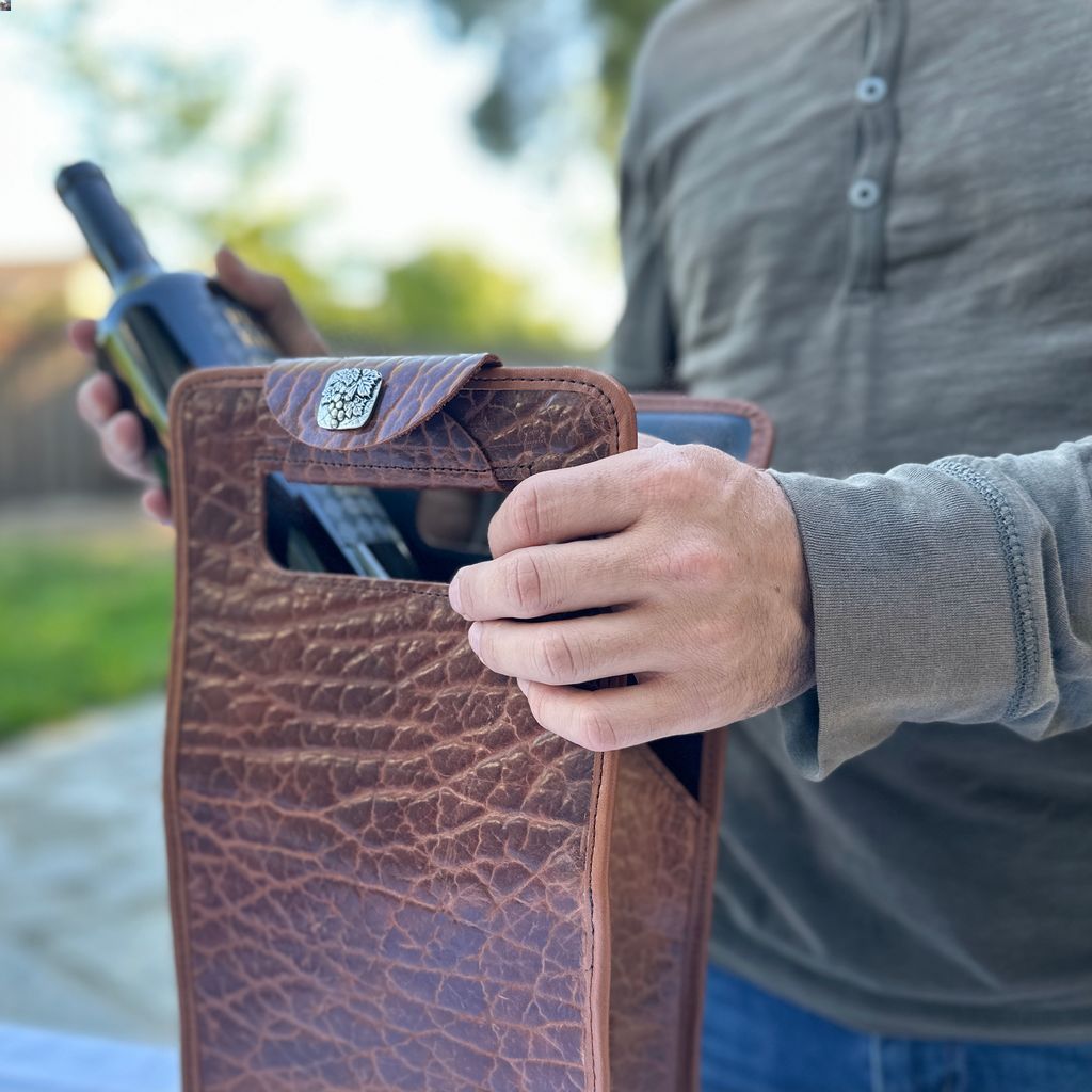 wine bottle carrier bag in glazed shrunk bison leather model with wine bottle